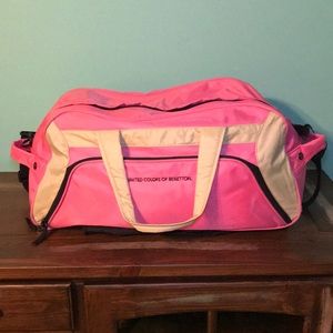Large neon pink United Colors of Benetton duffle